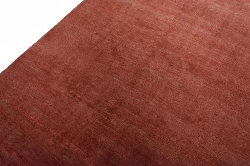 Backside of handmade New Persian Gabbeh rug showing knot structure and weave density