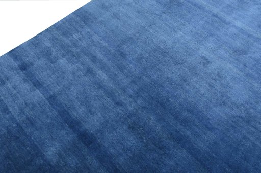 Backside of handmade New Persian Gabbeh rug showing knot structure and weave density