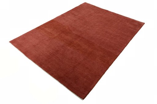 Corner detail of New Persian Gabbeh rug showing border pattern and Wool pile