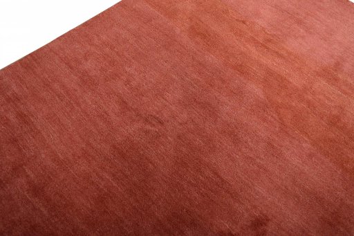 Backside of handmade New Persian Gabbeh rug showing knot structure and weave density
