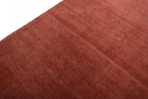 Backside of handmade New Persian Gabbeh rug showing knot structure and weave density