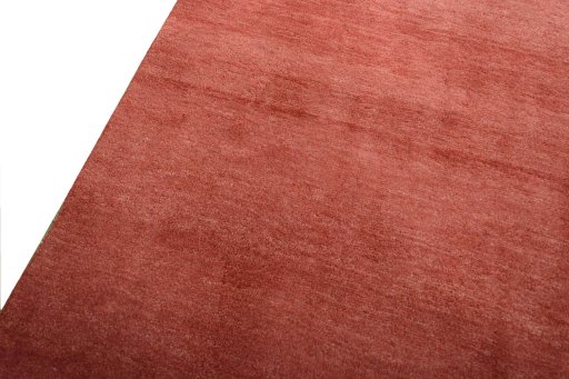 Backside of handmade New Persian Gabbeh rug showing knot structure and weave density