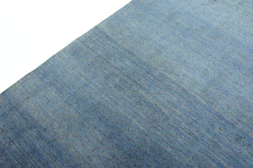 Backside of handmade New Persian Gabbeh rug showing knot structure and weave density