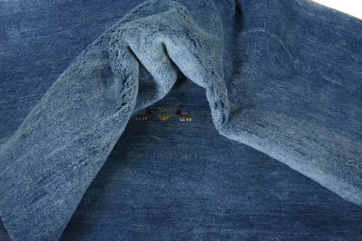 Corner detail of New Persian Gabbeh rug showing border pattern and Wool pile