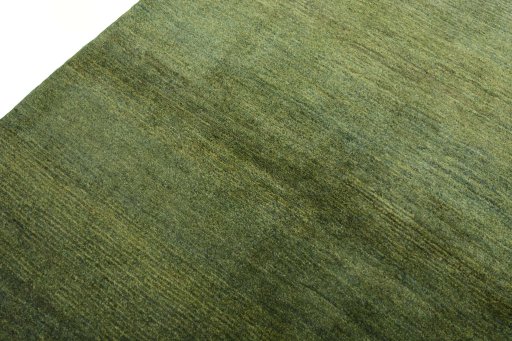 Backside of handmade New Persian Gabbeh rug showing knot structure and weave density