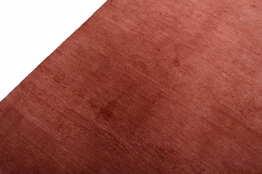 Backside of handmade New Persian Gabbeh rug showing knot structure and weave density