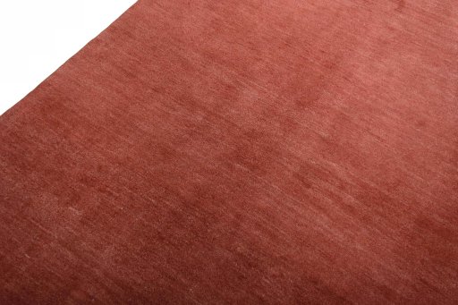 Backside of handmade New Persian Gabbeh rug showing knot structure and weave density