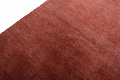 Backside of handmade New Persian Gabbeh rug showing knot structure and weave density