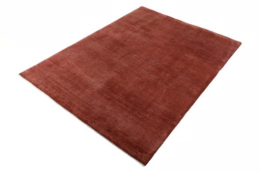 Corner detail of New Persian Gabbeh rug showing border pattern and Wool pile