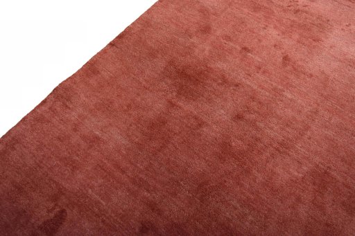 Backside of handmade New Persian Gabbeh rug showing knot structure and weave density