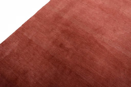 Backside of handmade New Persian Gabbeh rug showing knot structure and weave density