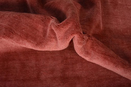 Corner detail of New Persian Gabbeh rug showing border pattern and Wool pile