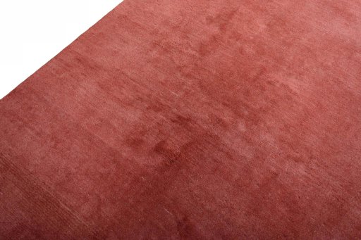 Backside of handmade New Persian Gabbeh rug showing knot structure and weave density