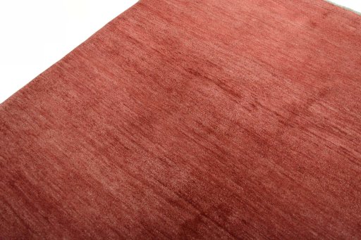 Backside of handmade New Persian Gabbeh rug showing knot structure and weave density