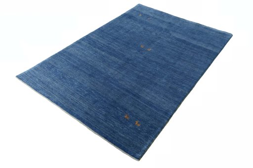 Corner detail of New Persian Gabbeh rug showing border pattern and Wool pile