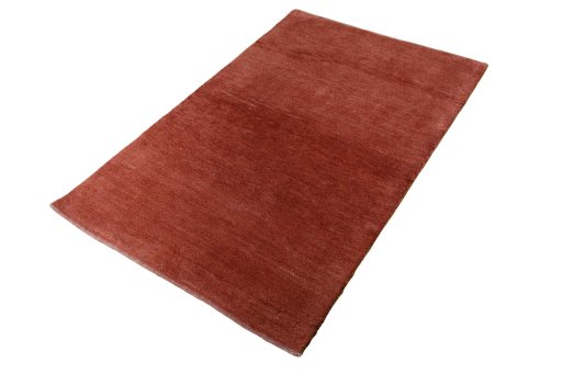 Corner detail of New Persian Gabbeh rug showing border pattern and Wool pile