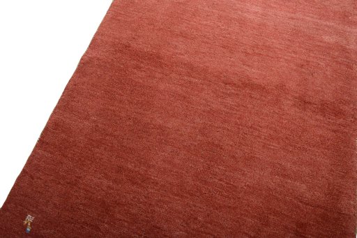 Backside of handmade New Persian Gabbeh rug showing knot structure and weave density