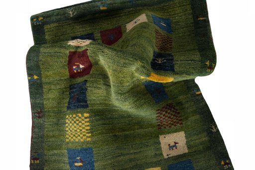 Corner detail of New Persian Gabbeh rug showing border pattern and Wool pile