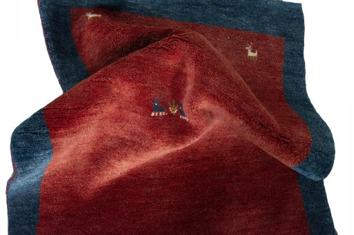 Corner detail of New Persian Gabbeh rug showing border pattern and Wool pile