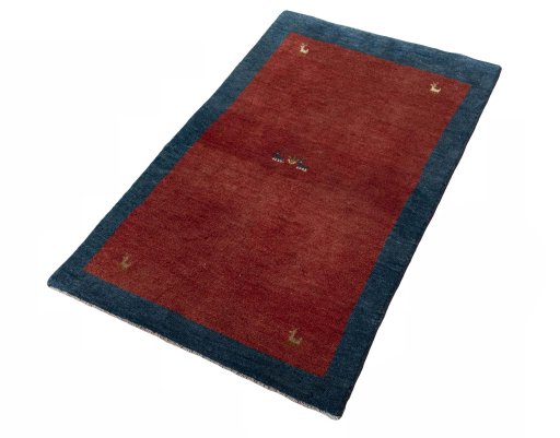 Corner detail of New Persian Gabbeh rug showing border pattern and Wool pile