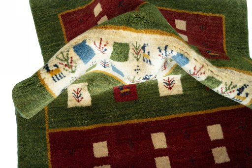 Corner detail of New Persian Gabbeh rug showing border pattern and Wool pile