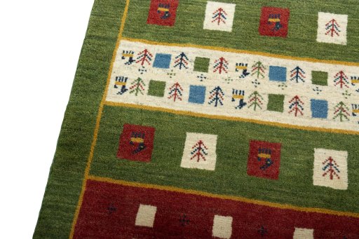 Backside of handmade New Persian Gabbeh rug showing knot structure and weave density