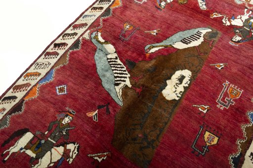 Backside of handmade 2000s Persian Gabbeh rug showing knot structure and weave density