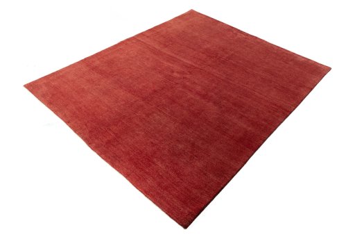 Corner detail of New Persian Gabbeh rug showing border pattern and Wool pile