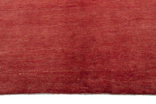 Backside of handmade New Persian Gabbeh rug showing knot structure and weave density