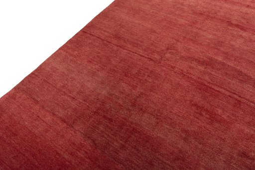 Backside of handmade New Persian Gabbeh rug showing knot structure and weave density