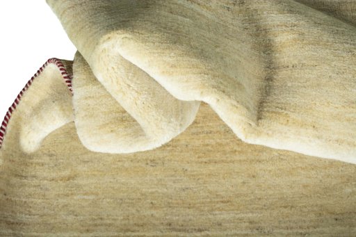 Corner detail of New Persian Gabbeh rug showing border pattern and Wool pile