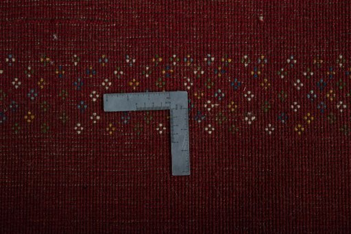 Corner detail of New Persian Gabbeh rug showing border pattern and Wool pile