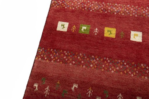 Backside of handmade New Persian Gabbeh rug showing knot structure and weave density