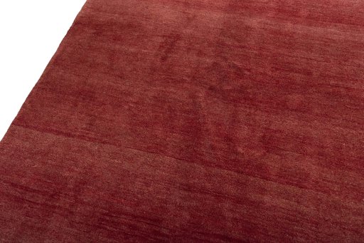 Backside of handmade New Persian Gabbeh rug showing knot structure and weave density