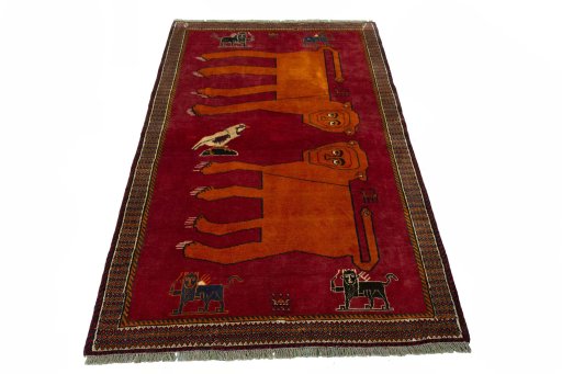 Surface texture of 2000s Persian Gabbeh rug with natural Wool and intricate pattern