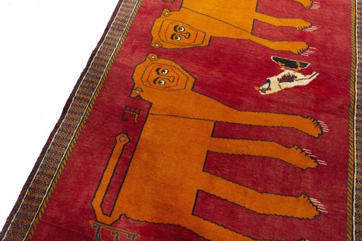 Backside of handmade 2000s Persian Gabbeh rug showing knot structure and weave density