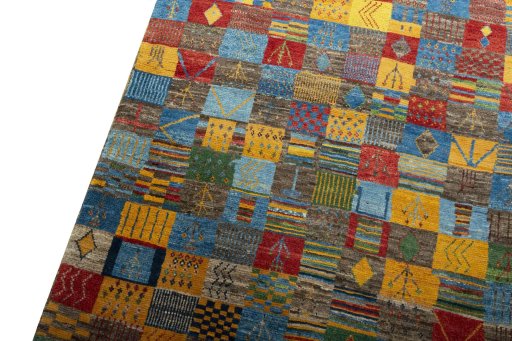Backside of handmade New Persian Gabbeh rug showing knot structure and weave density