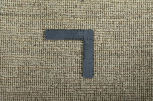 Corner detail of New Persian Gabbeh rug showing border pattern and Wool pile