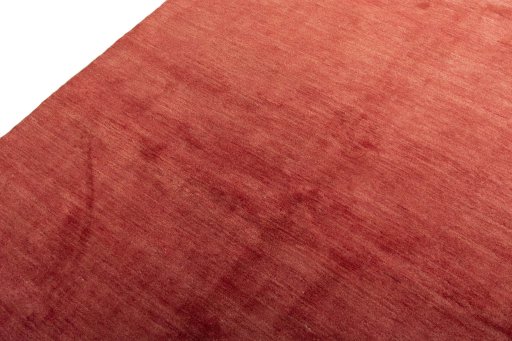 Backside of handmade New Persian Gabbeh rug showing knot structure and weave density
