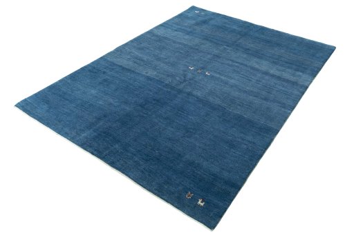 Corner detail of New Persian Gabbeh rug showing border pattern and Wool pile