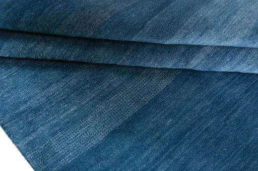 Full view of New Persian Gabbeh rug from Iran / Persia, 245 × 175 cm in Blue tones