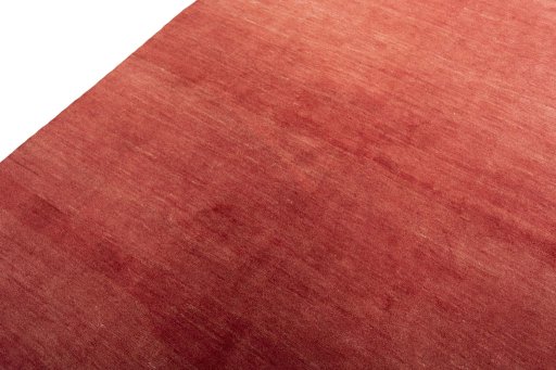 Backside of handmade New Persian Gabbeh rug showing knot structure and weave density
