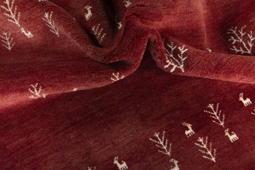 Corner detail of New Persian Gabbeh rug showing border pattern and Wool pile