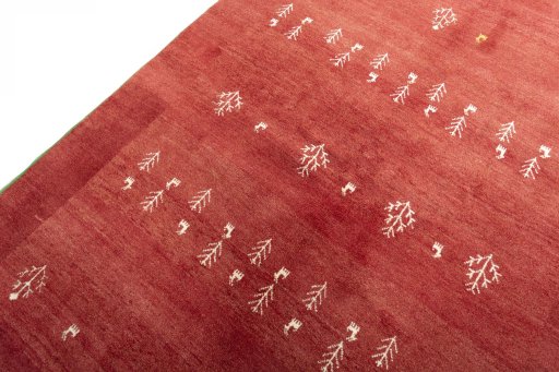 Backside of handmade New Persian Gabbeh rug showing knot structure and weave density