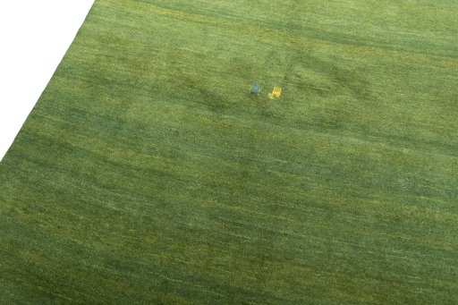 Backside of handmade New Persian Gabbeh rug showing knot structure and weave density