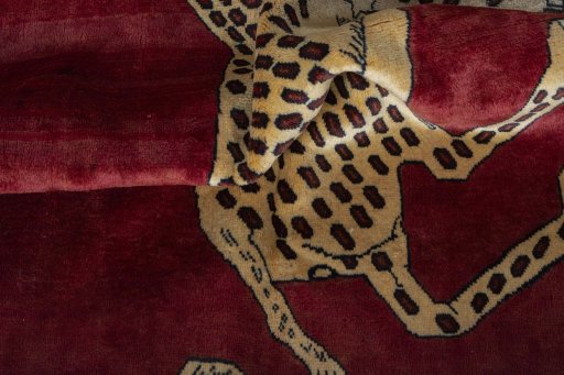 Corner detail of 2000s Persian Gabbeh rug showing border pattern and Wool pile