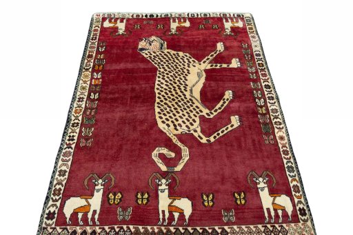 Surface texture of 2000s Persian Gabbeh rug with natural Wool and intricate pattern