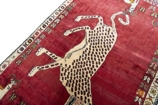 Backside of handmade 2000s Persian Gabbeh rug showing knot structure and weave density