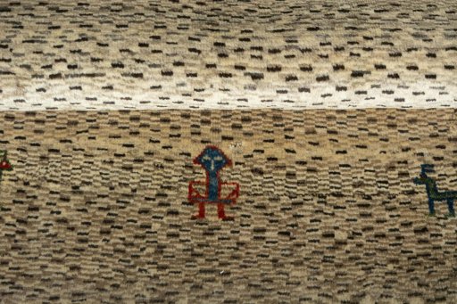 Full view of 2000s Persian Gabbeh rug from Iran / Persia, 145 × 95 cm in Beige tones