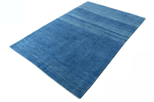 Corner detail of New Persian Gabbeh rug showing border pattern and Wool pile